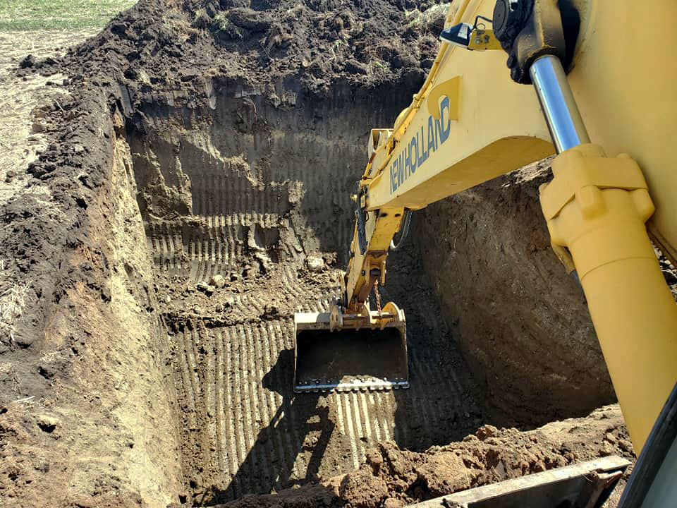 Excavation machine digging a hole.
